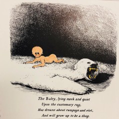 Illustration taken from An Edward Gorey Bestiary (1984) of a colorful naked baby on a white polar bear skin rug against a black hatched background. It is captioned “The baby, lying meek and quiet upon the customary rug, has dreams about rampage and riot, and will grow up to be a thug."