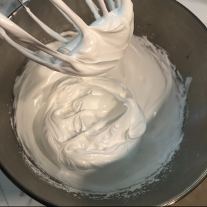 egg whites beaten in a mixing bowl